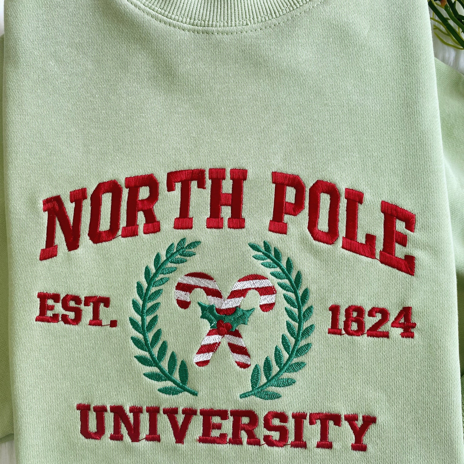 North Pole University Embroidered Christmas Sweatshirt Holiday Crew Neck Hoodie image 2