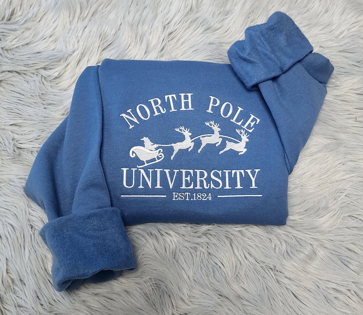 Embroidered North Pole University Christmas Sweatshirt Unisex Crewneck or Hooded Santa Sweater image 1