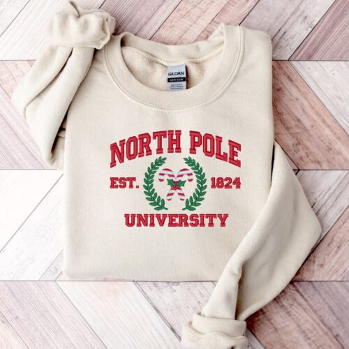 North Pole University Embroidered Sweatshirt Christmas Candy Cane Sleeve Crewneck image 0