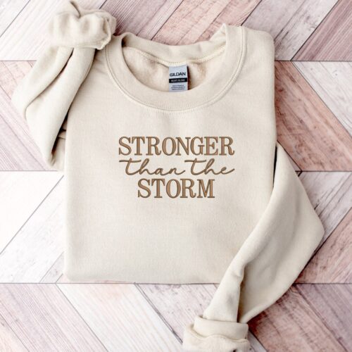 Stronger Than The Storm Embroidered Crewneck Sweatshirt Motivational Embroidered Pullover image 0