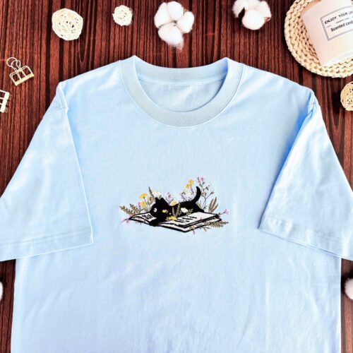 Cat and Book Lover T-Shirt Embroidered Cat on Book with Flower Unisex Crew Neck Tee image 0