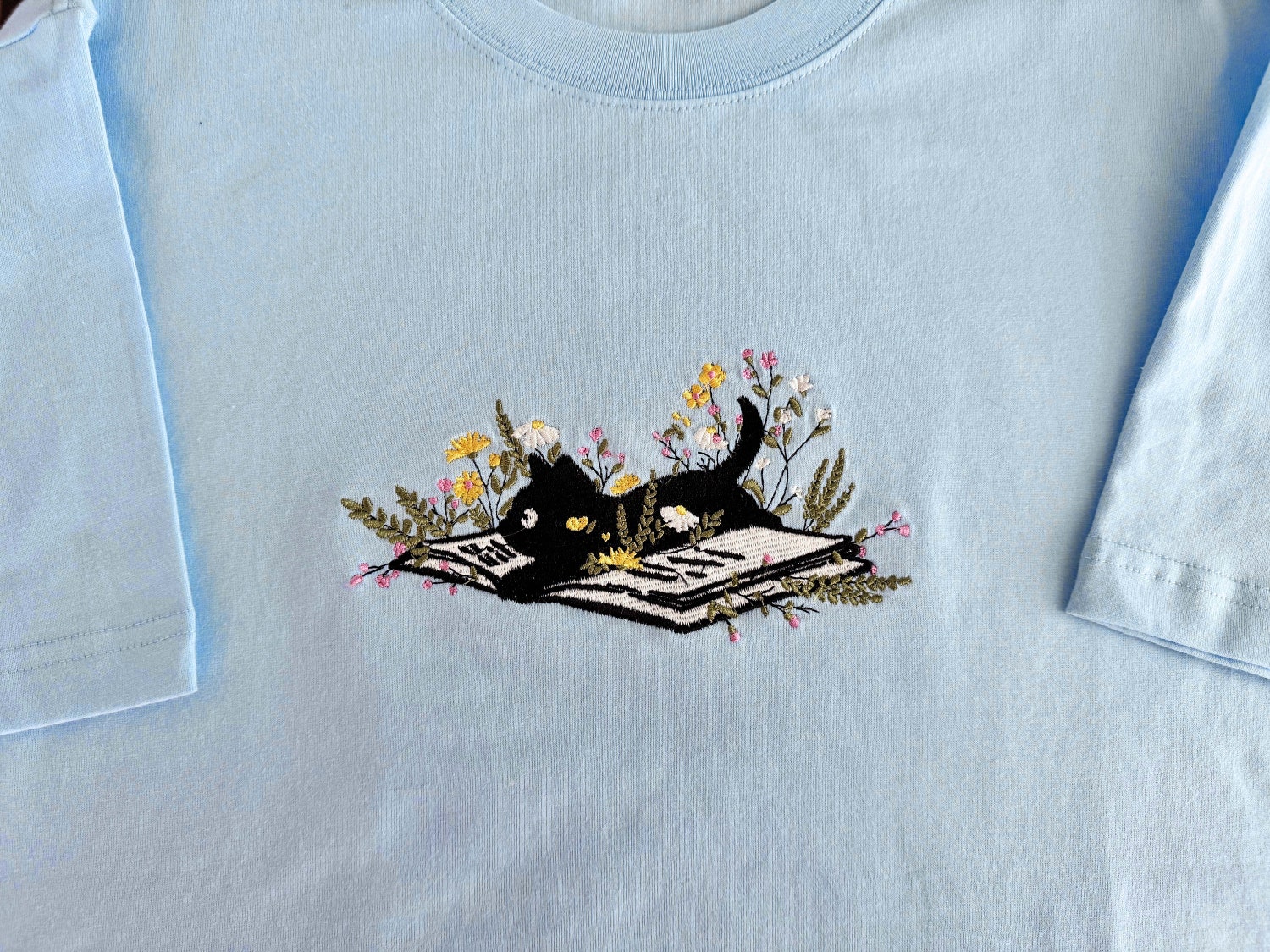 Cat and Book Lover T-Shirt Embroidered Cat on Book with Flower Unisex Crew Neck Tee image 1