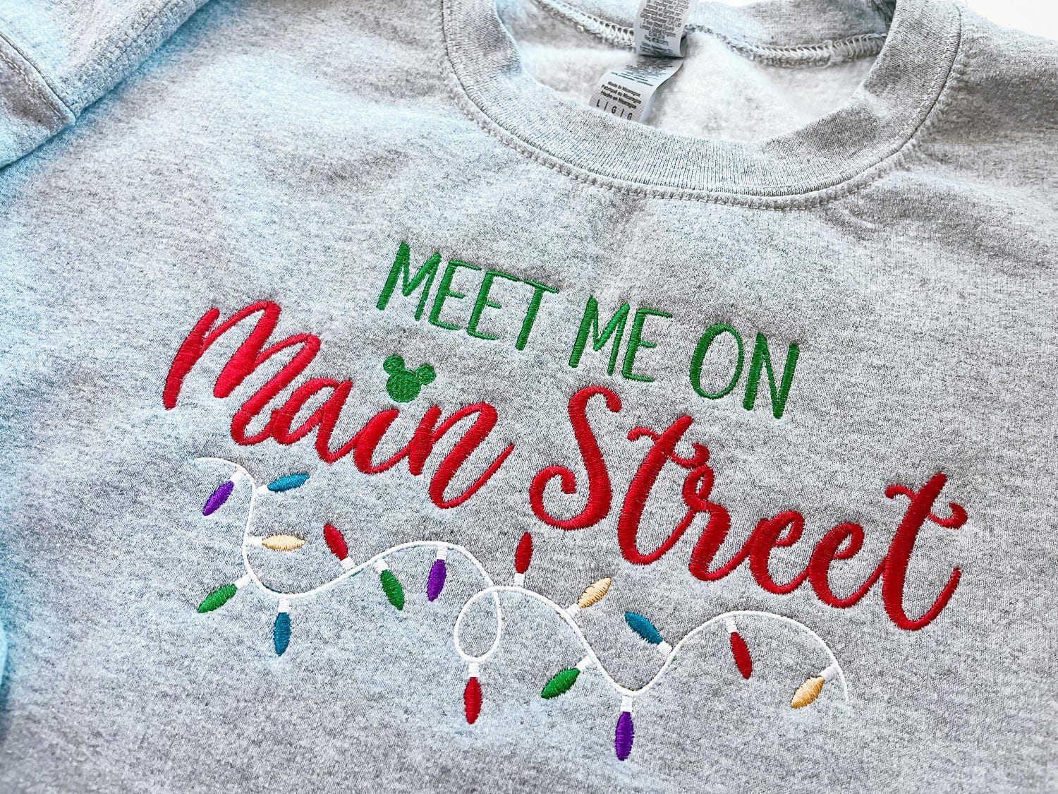 Christmas Main Street USA Embroidered Sweatshirt Mickey's Very Merry Magic Kingdom Shirt image 1